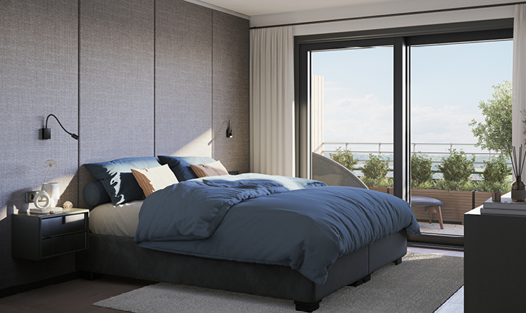 Ein modernes Schlafzimmer mit Balkon und Blick auf die Berge