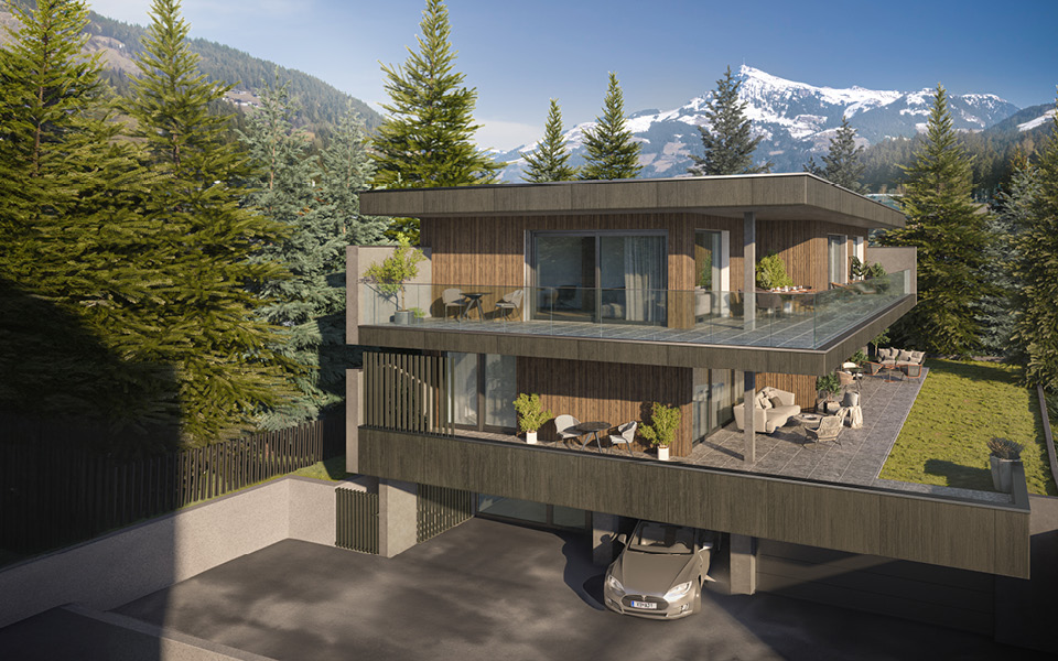 Außenansicht der Villa mit verschneiten Bergen im Hintergrund